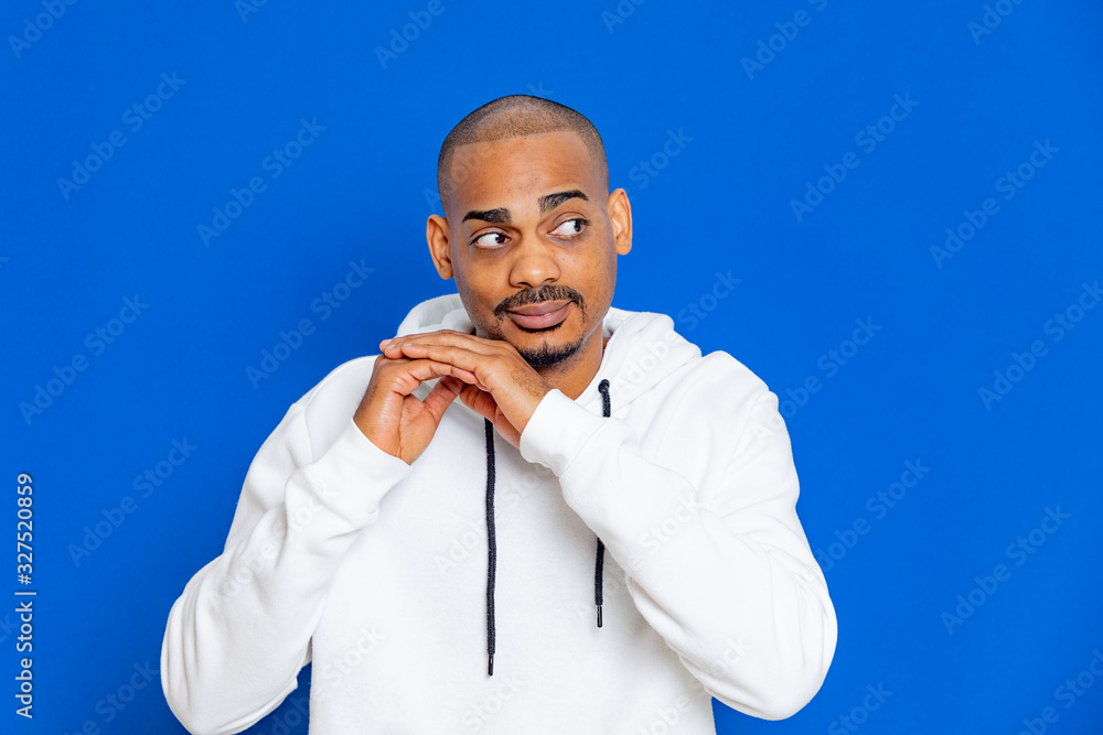African guy wearing a white sweatshirt African guy wearing a white sweatshirt