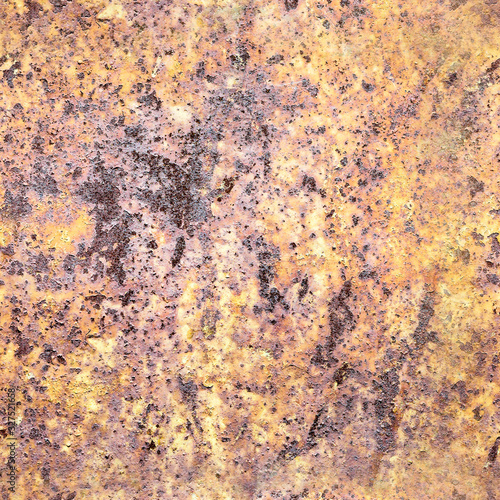 Vintage background of rusty metal sheet with exfoliated yellow paint, seamless pattern