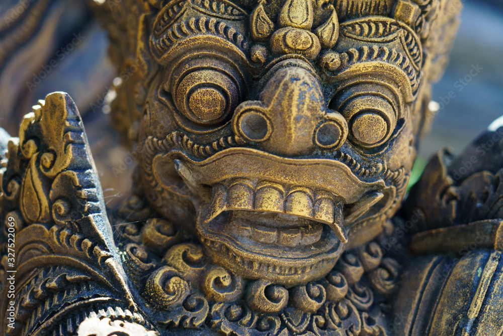 Ancient Balinese statue at the temple Ancient Balinese statue at the temple