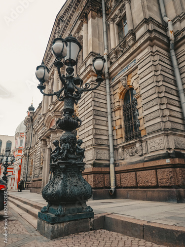 Photography Facade of a beautiful old building with columns and a lantern in St