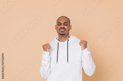 African guy with a white sweatshirt © Gelpi