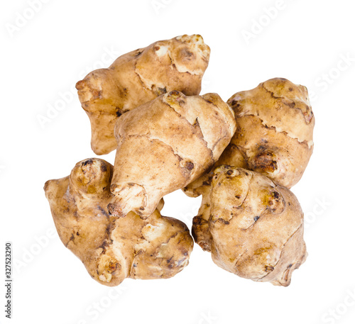 pile from raw tubers of jerusalem artichoke