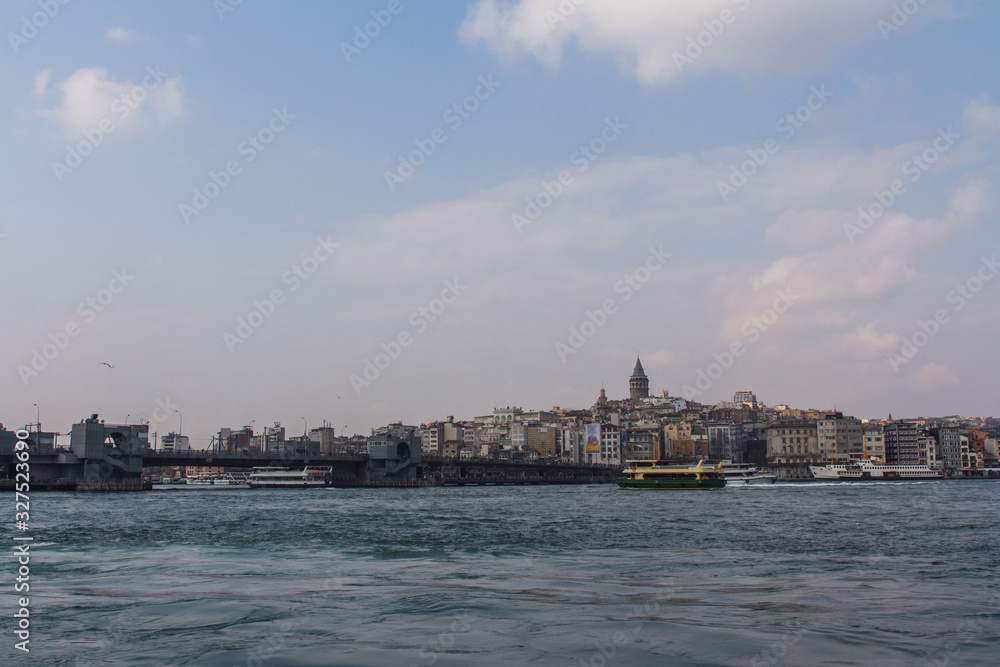 View of the Bosphorus and Istanbul's Karakoy district on a sunny day. Turkey
