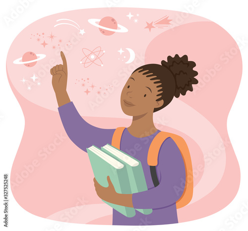 Young black school girl holding books and pointing at the stars