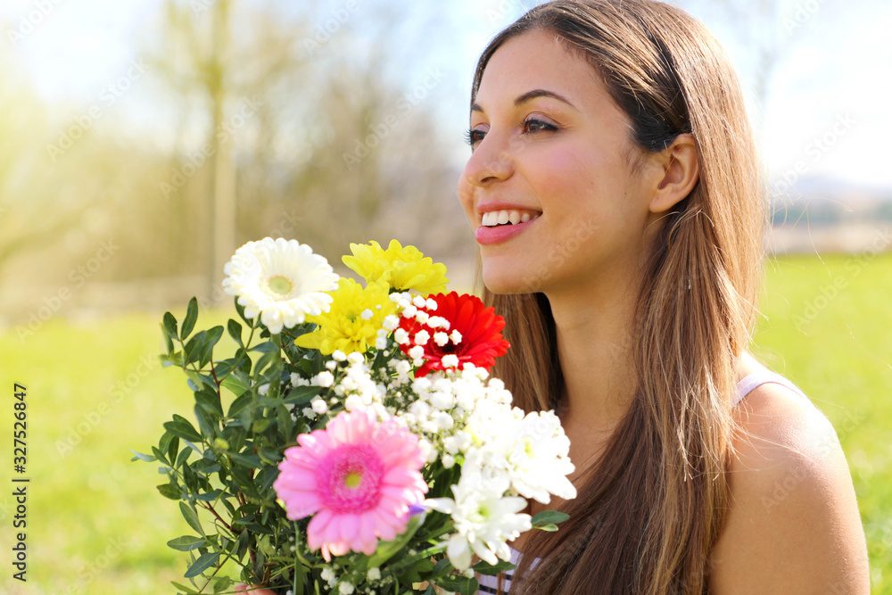 Happy beautiful girl receives a bouquet of flowers on International Women's Day Happy beautiful girl receives a bouquet of flowers on International Women's Day