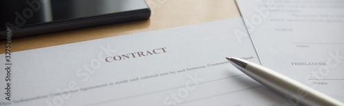 A contract on the desk. 