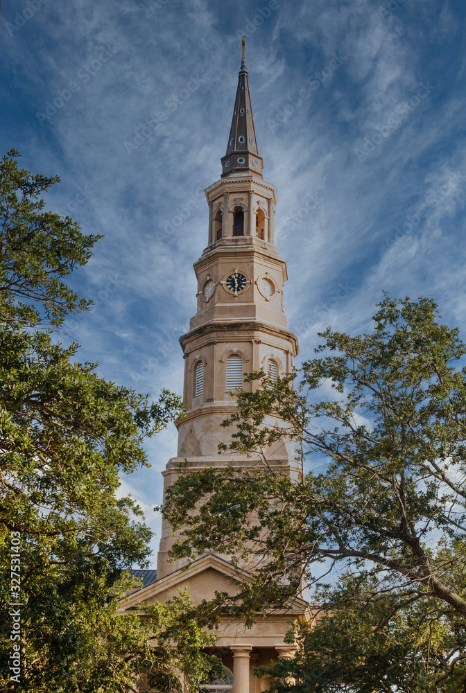 An old church steeple with clock in Charleston, South Carolina