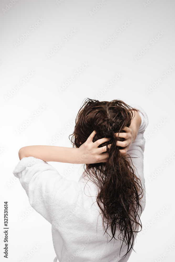 back view of young woman touching wet clean hair isolated on white back view of young woman touching wet clean hair isolated on white