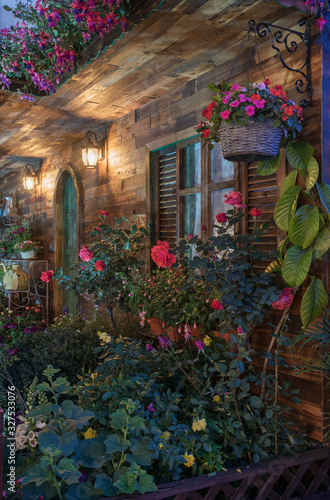 Fototapeta Naklejka Na Ścianę i Meble -  Landscaped backyard flower garden of residential house