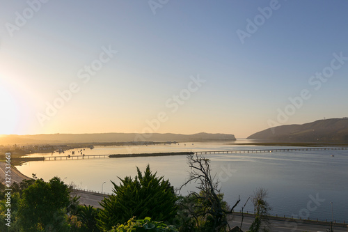 morning over lagoon water sunrise knysna heads south africa