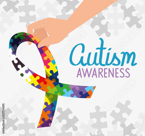 world autism day with ribbon of puzzle pieces vector illustration design