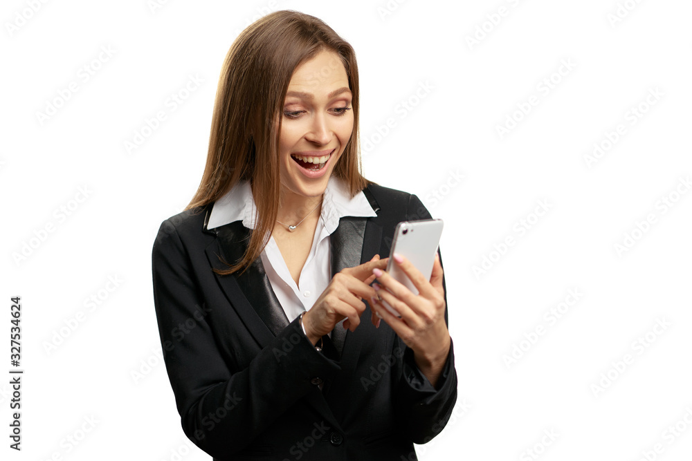 Studio portrait of young business woman using smartphone. Isolated on white. Studio portrait of young business woman using smartphone. Isolated on white.