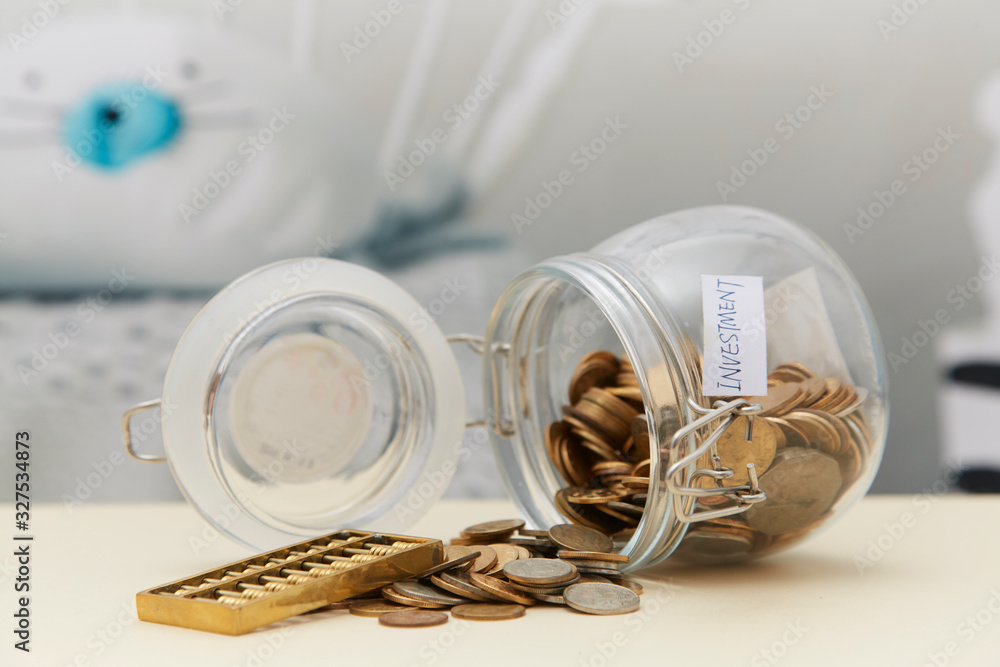 Coin sapling and alarm clock in the piggy bank Coin sapling and alarm clock in the piggy bank