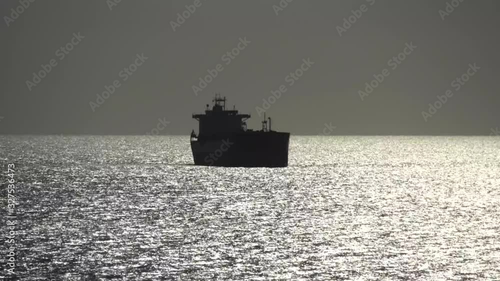 One ship standing offshore, in the open sea, ocean, summer. Time-lapse, Limassol, Cyprus, 4K One ship standing offshore, in the open sea, ocean, summer. Time-lapse, Limassol, Cyprus, 4K
