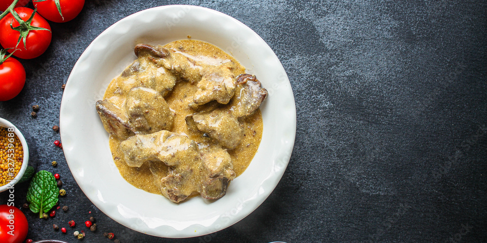 liver cream stew, creamy sauce (chicken liver, healthy diet eating) keto or paleo diet menu concept background. top view. copy space for text