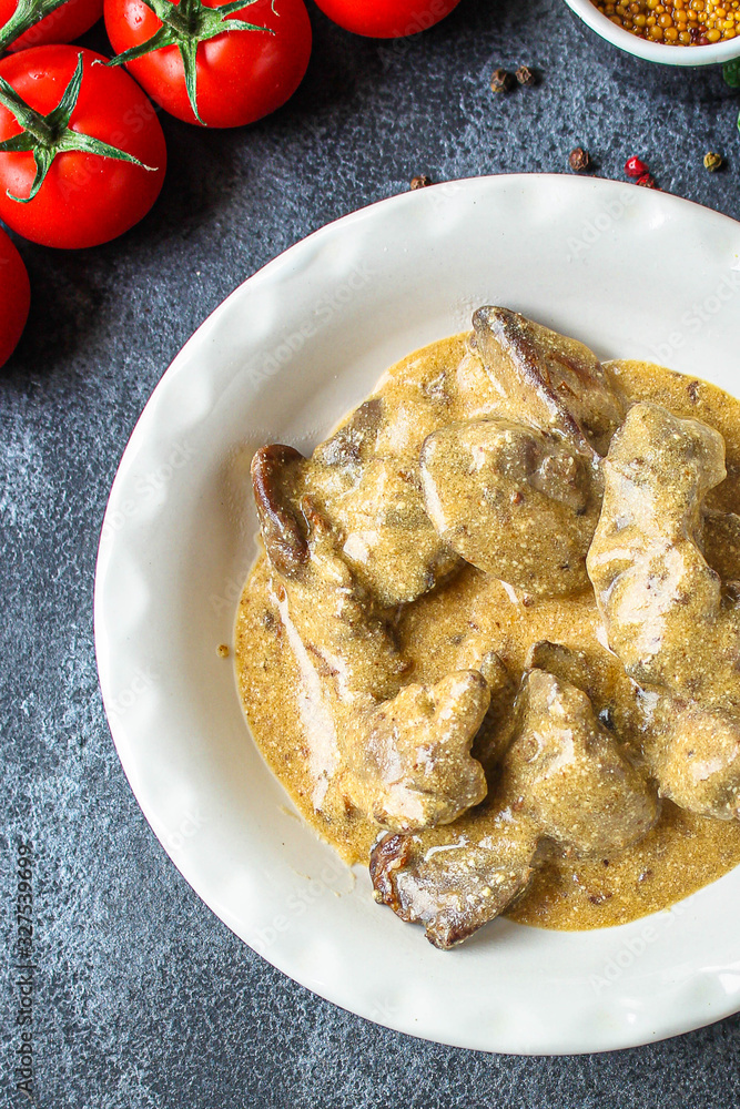 liver cream stew, creamy sauce (chicken liver, healthy diet eating) keto or paleo diet menu concept background. top view. copy space for text liver cream stew, creamy sauce (chicken liver, healthy diet eating) keto or paleo diet menu concept background. top view. copy space for text