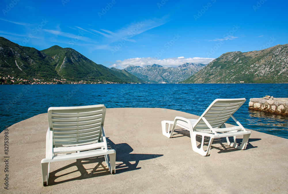 Landscape view of the Bay of Kotor on background of mountains and sky