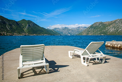 Landscape view of the Bay of Kotor on background of mountains and sky