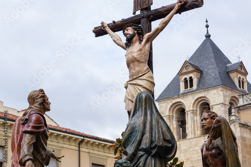 Leon, Spain. 4/19/2019. Pass in the Holy Week of Leon known as La Crucifixion that leaves on Holy Friday. It is in the Square of San Isidoro photo