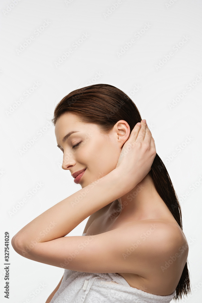 smiling young woman with closed eyes touching long clean hair isolated on white smiling young woman with closed eyes touching long clean hair isolated on white