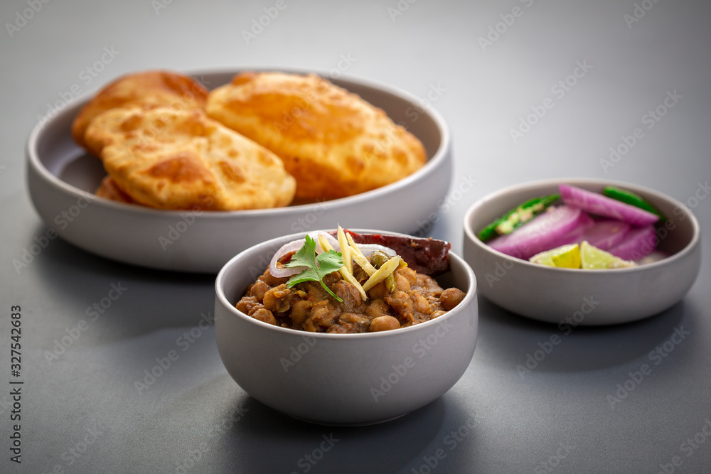 choley bhature is a dish originated initially in the northern part of the Indian subcontinent. It is a combination of chana masala and bhatura, a fried bread made from maida. choley bhature is a dish originated initially in the northern part of the Indian subcontinent. It is a combination of chana masala and bhatura, a fried bread made from maida.