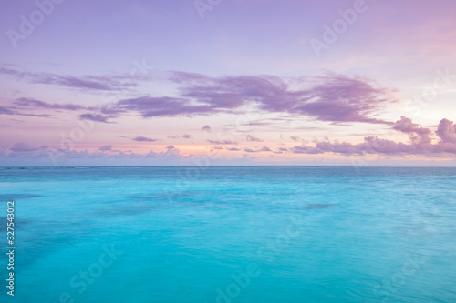Peaceful, tranquil, relaxing seascape. Inspirational calm sea with sunset sky. Meditation ocean and sky background. Colorful horizon over the water