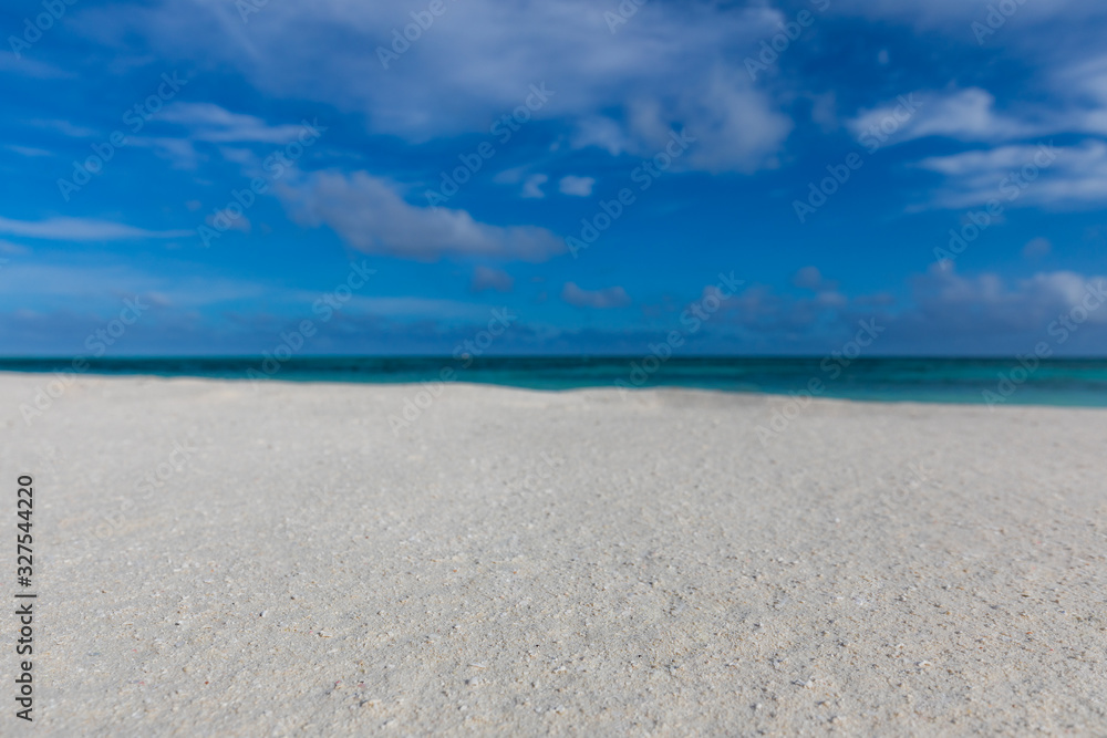 Landscape of sand on beach and blue summer sky. Tropical nature pattern Landscape of sand on beach and blue summer sky. Tropical nature pattern