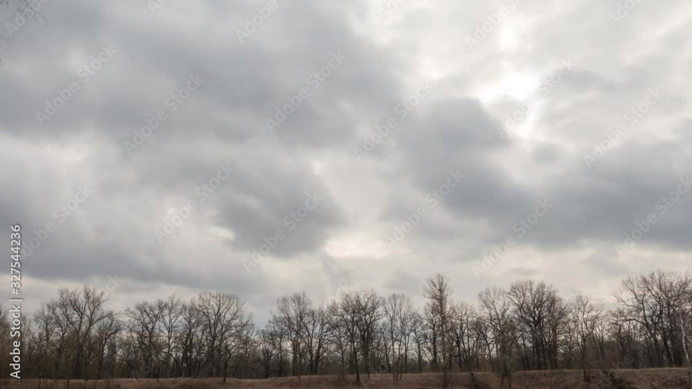 clouds on a gray gloomy sky in early spring clouds on a gray gloomy sky in early spring