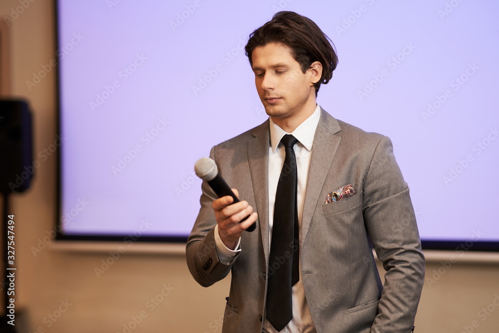 Businessman having speech during conference Businessman having speech during conference