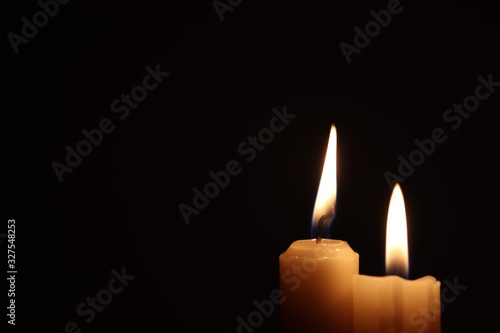 Candle black background of mourning funeral moment of silence	