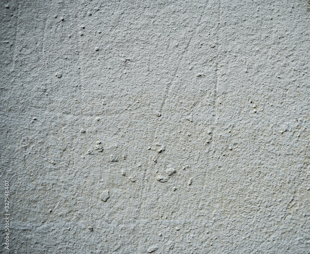 Texture of an old wall covered with paint. Background image of a worn paint coated surface Texture of an old wall covered with paint. Background image of a worn paint coated surface