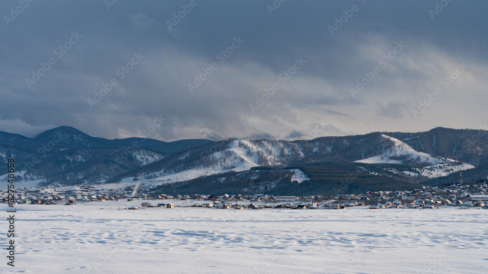 Landscape mountain village covered with snow Landscape mountain village covered with snow