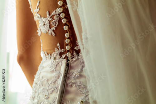 detalhes de vestido de noiva photo