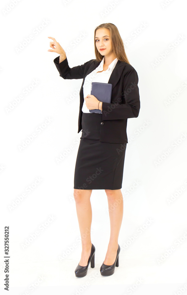 Beautiful young business woman standing on a tablet isolated on white background, Beautiful young business woman standing on a tablet isolated on white background,