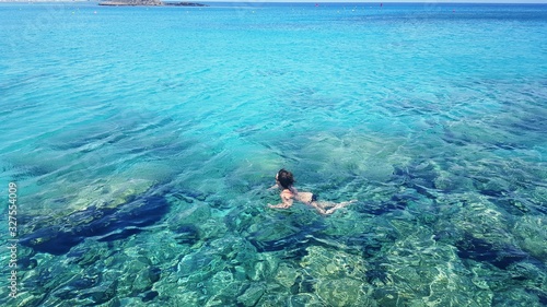 man snorkeling in the sea