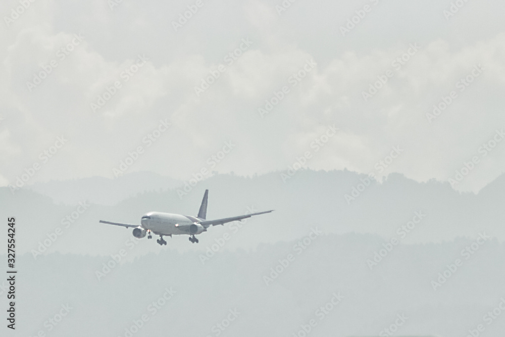 The plane is flying in the clouds, copy space for design. the effect of noise as a creative idea The plane is flying in the clouds, copy space for design. the effect of noise as a creative idea
