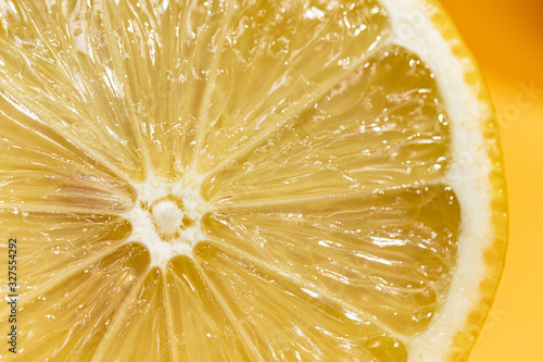 Close-up acid slice of lemon