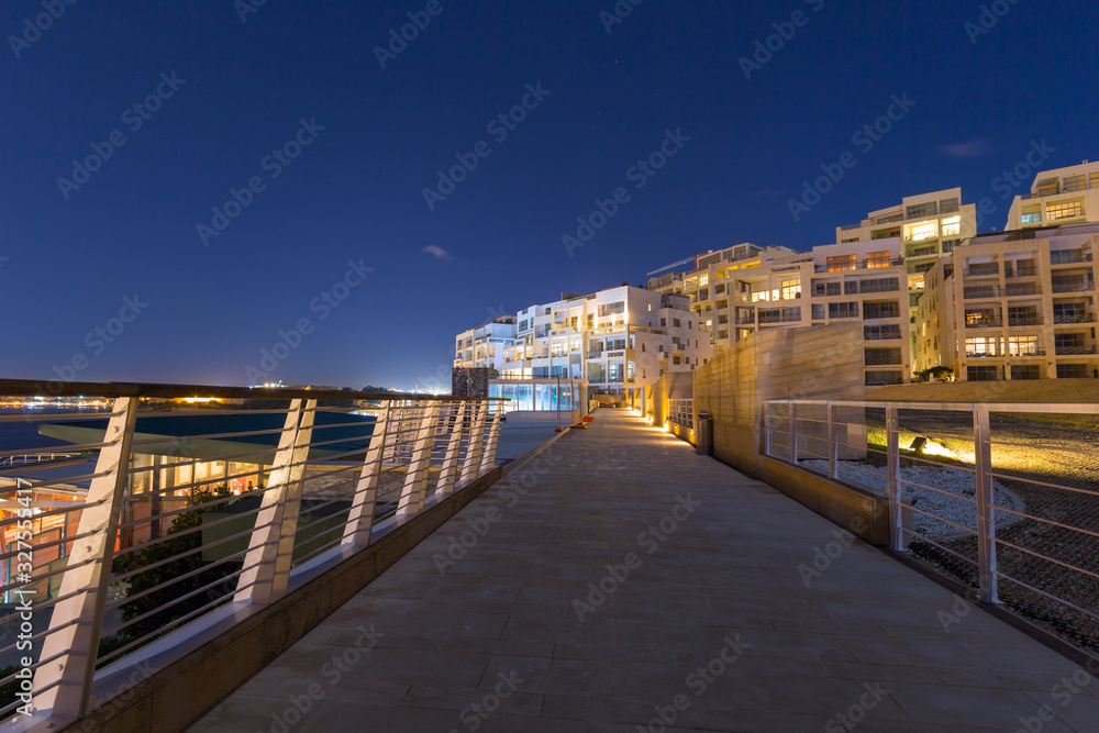 Architecture of the residential area in Sliema at night, Malta
