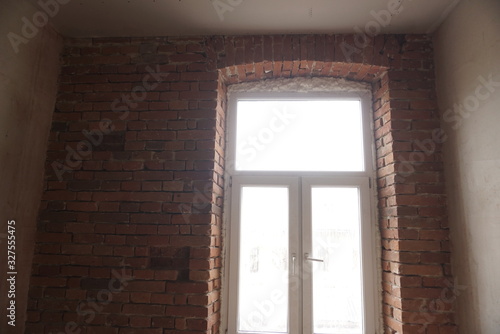 Shot Of A Window In A Brick Wall in Old Room