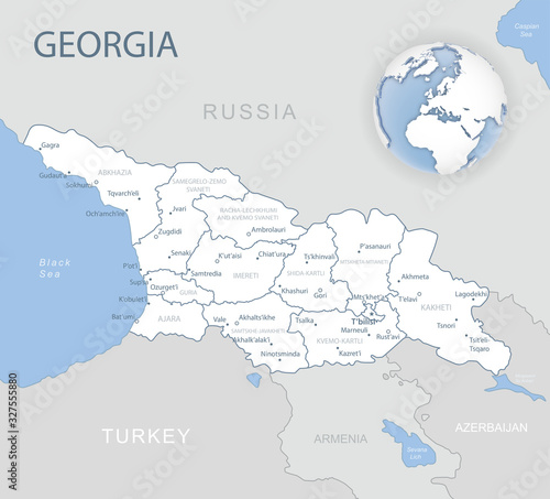 Blue-gray detailed map of Georgia and administrative divisions and location on the globe. Vector illustration