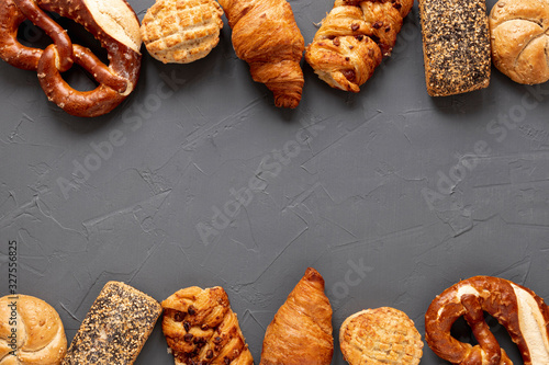 Bagels and croissants frame with copy space