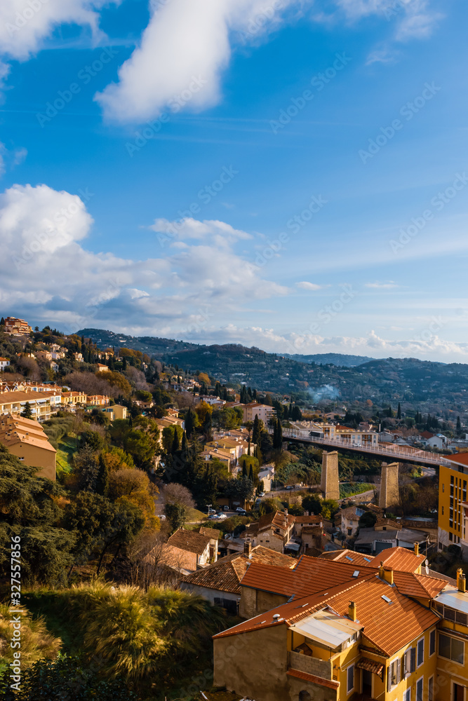 The cityscape of a touristic French Côte d'Azur town under the blue sky (Grasse, France)