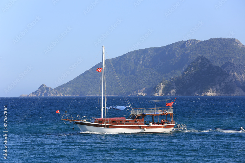 boat with Turkish flags on sea