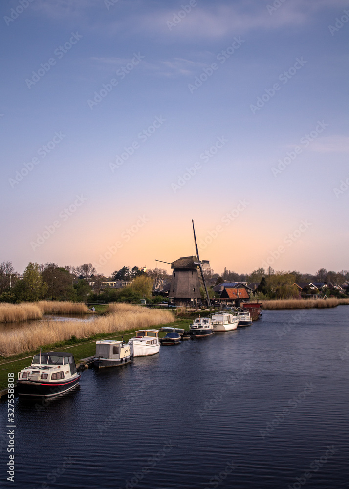 Fototapeta premium Windmill in evening sun