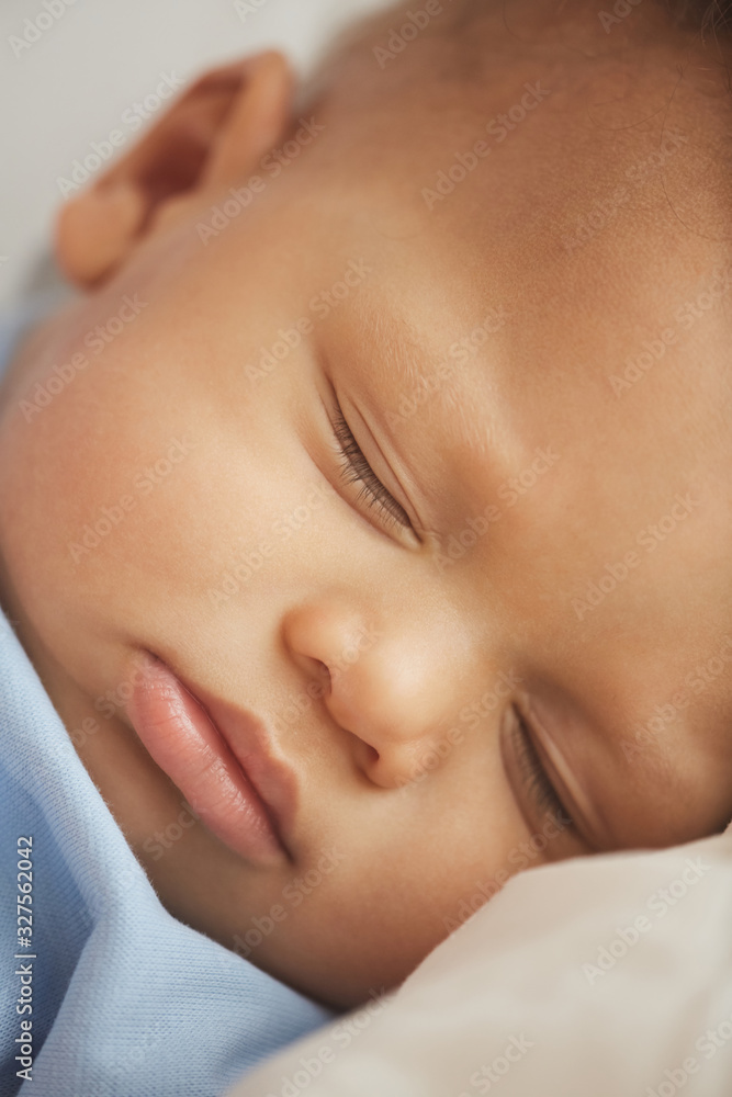 Close up portrai of cute mixed-race baby sleeping soundly Close up portrai of cute mixed-race baby sleeping soundly