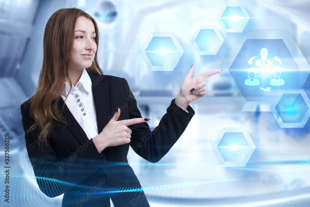 Business, Technology, Internet and network concept. Young businessman working on a virtual screen of the future and sees the inscription: Business, Technology, Internet and network concept. Young businessman working on a virtual screen of the future and sees the inscription: