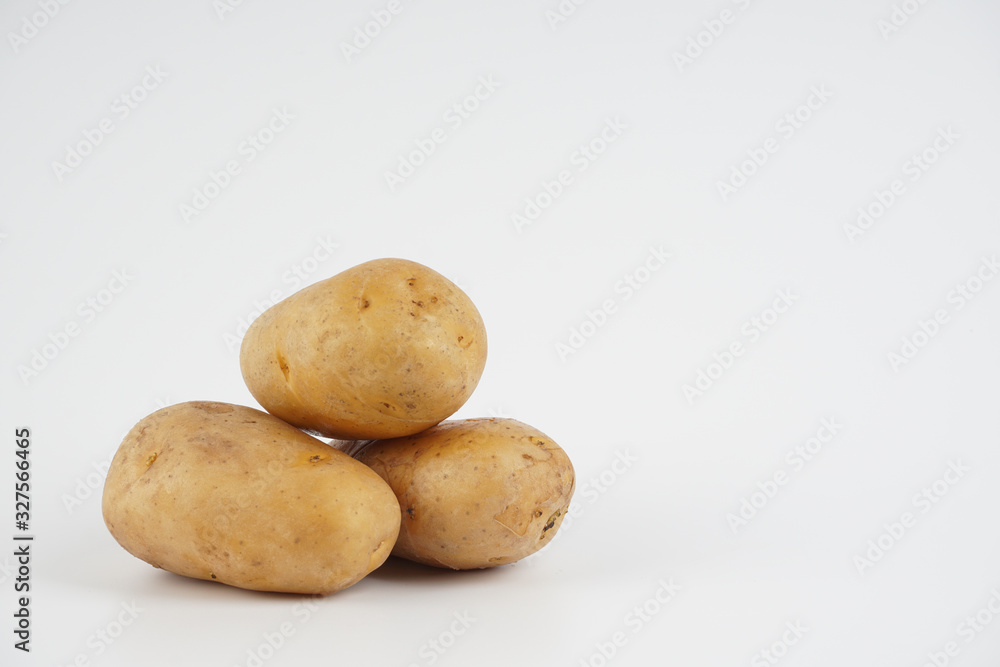 Potatoes over white background. Food concept Potatoes over white background. Food concept