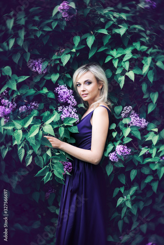 girl in the flowers of lilac