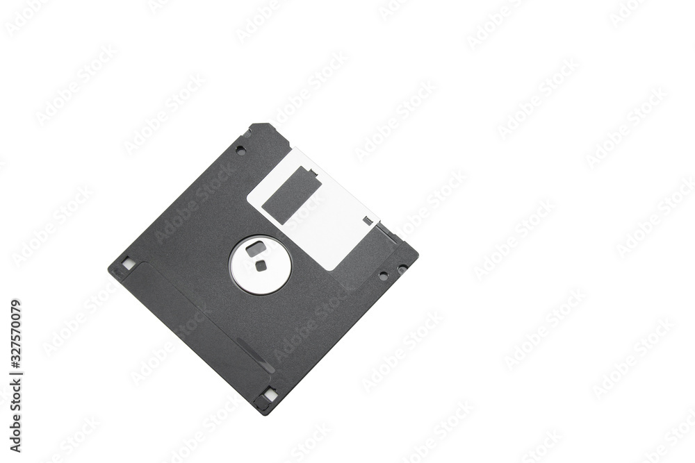Old black floppy disk for FDD drive. Digital vintage drive. 1.44 megabyte retro data warehouse. Diskette on a white isolated background. Good quality. Old black floppy disk for FDD drive. Digital vintage drive. 1.44 megabyte retro data warehouse. Diskette on a white isolated background. Good quality.