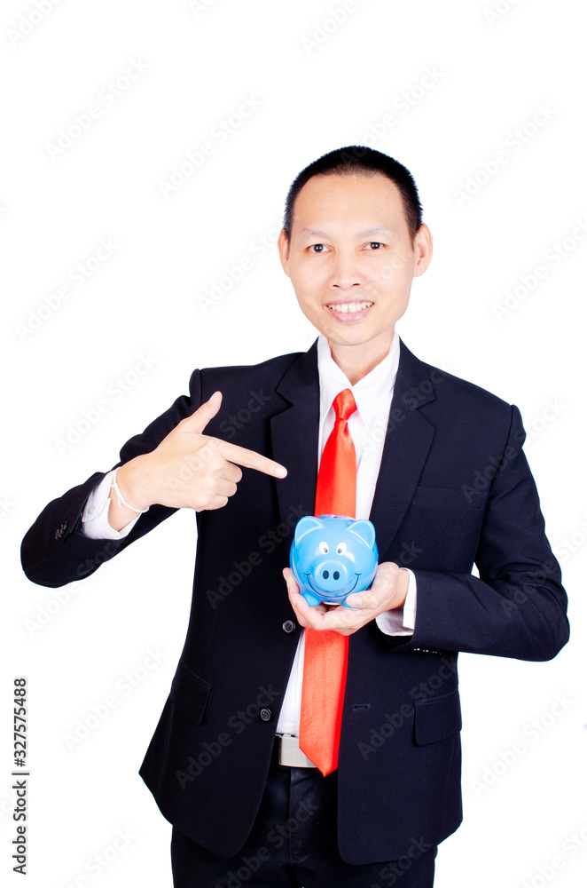 Asia business man smile and hand ponting and holding blue piggy bank on white backgrounds Asia business man smile and hand ponting and holding blue piggy bank on white backgrounds